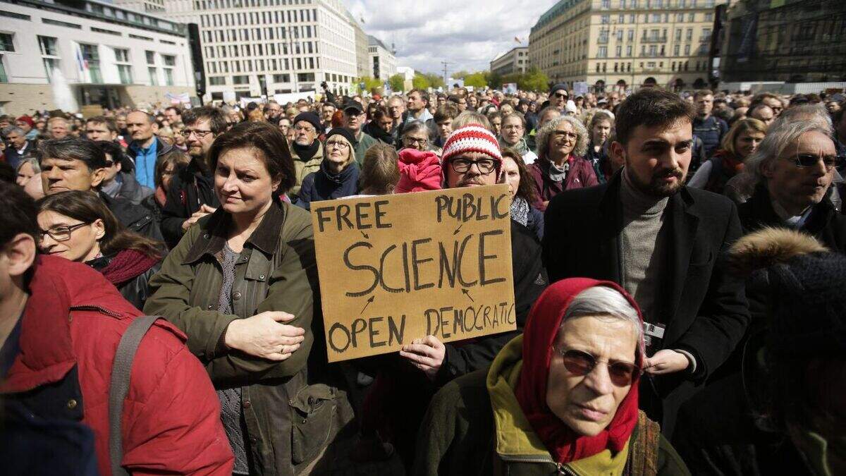 Scientists take to streets across globe to defend research | Belfast ...