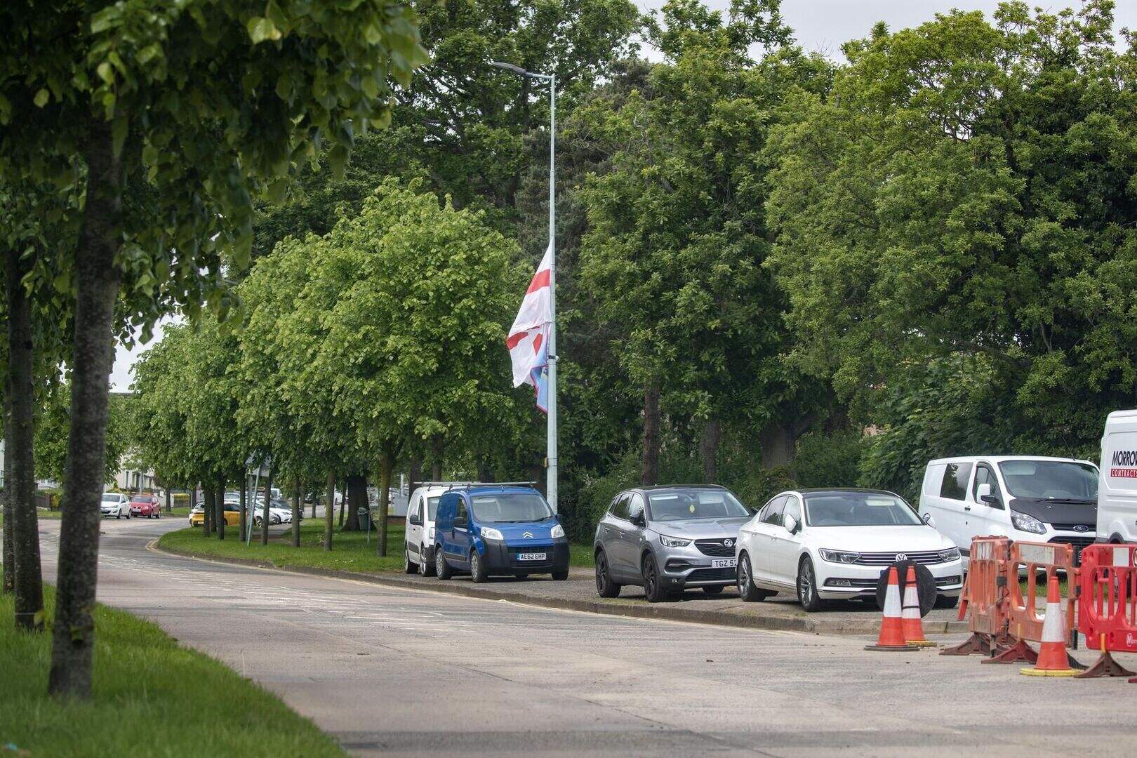 UDA plasters terror flags outside new apartments complex | Belfast ...