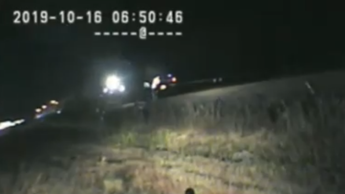 US officer pulls man from car – seconds before it is hit by a train ...