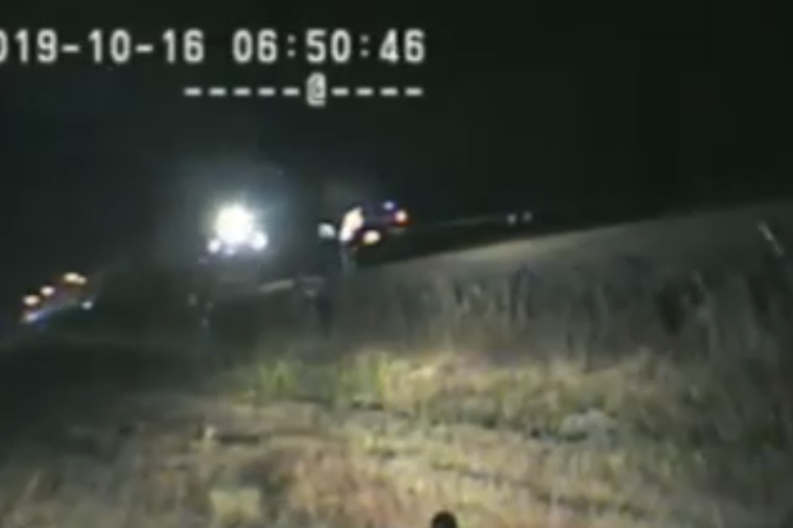 US officer pulls man from car – seconds before it is hit by a train ...