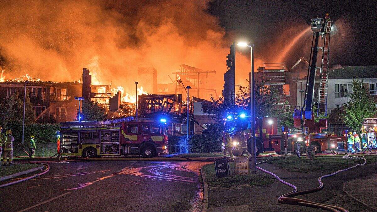 Huge blaze rips through retirement complex and causes collapse of ...