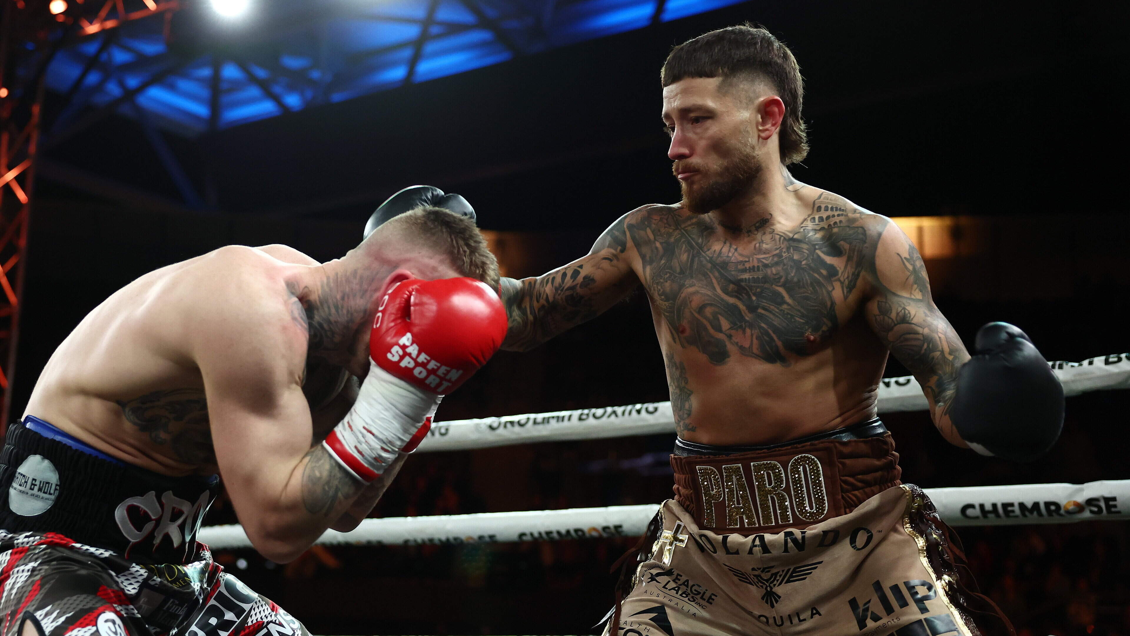 Liam Paro takes Lewis Crocker’s welterweight world title in bloody battle in Brisbane