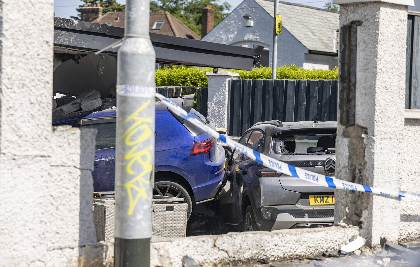 Dorchester Park: Man and woman arrested after car crashes into house in ...