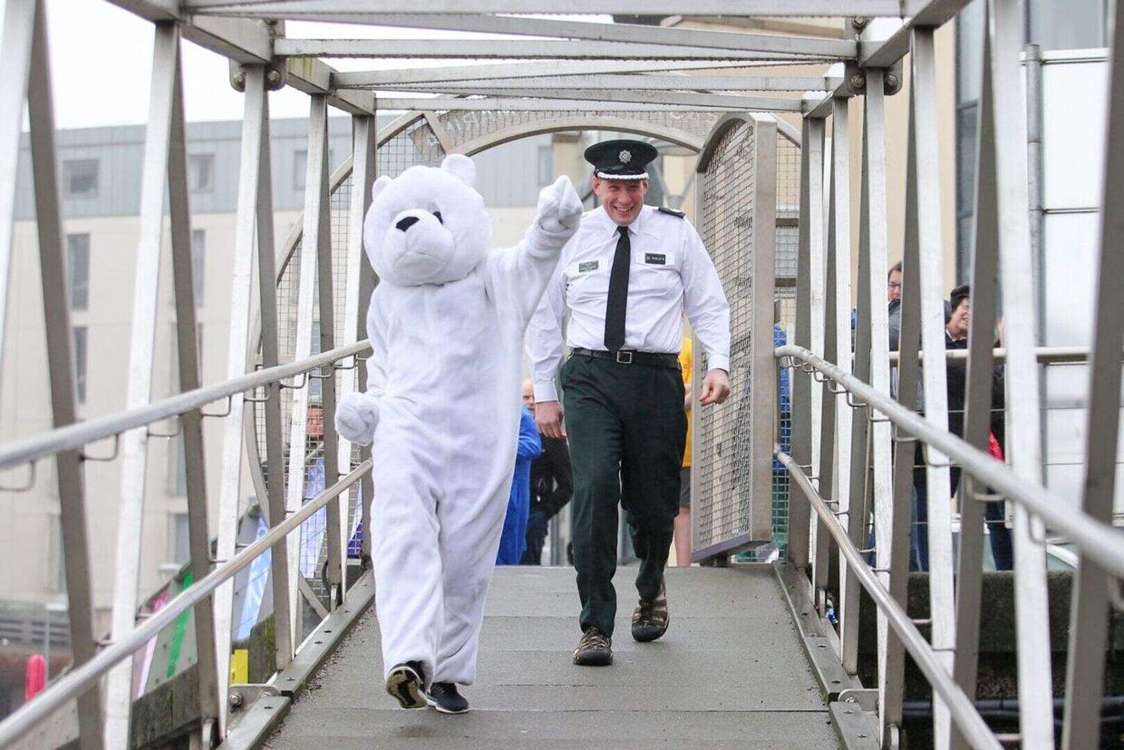 Splash! Charity fundraisers take polar plunge into Belfast's Lagan ...