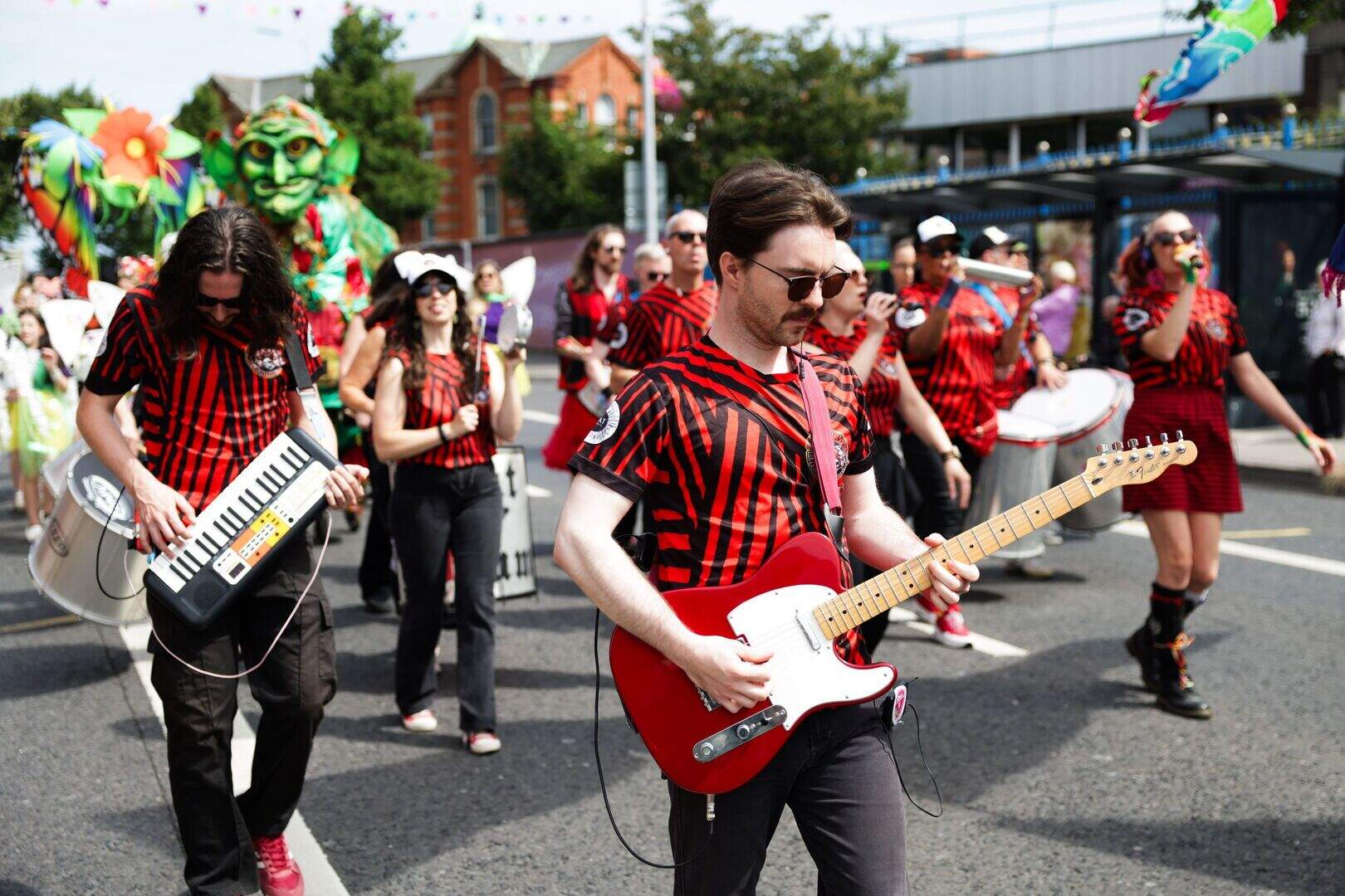 In pictures: Huge crowds flock to Féile an Phobail for opening parade ...