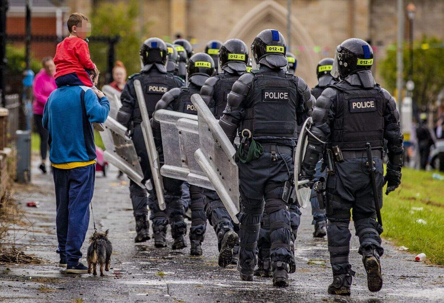 Missiles thrown at PSNI during west Belfast bonfire removal | Belfast ...