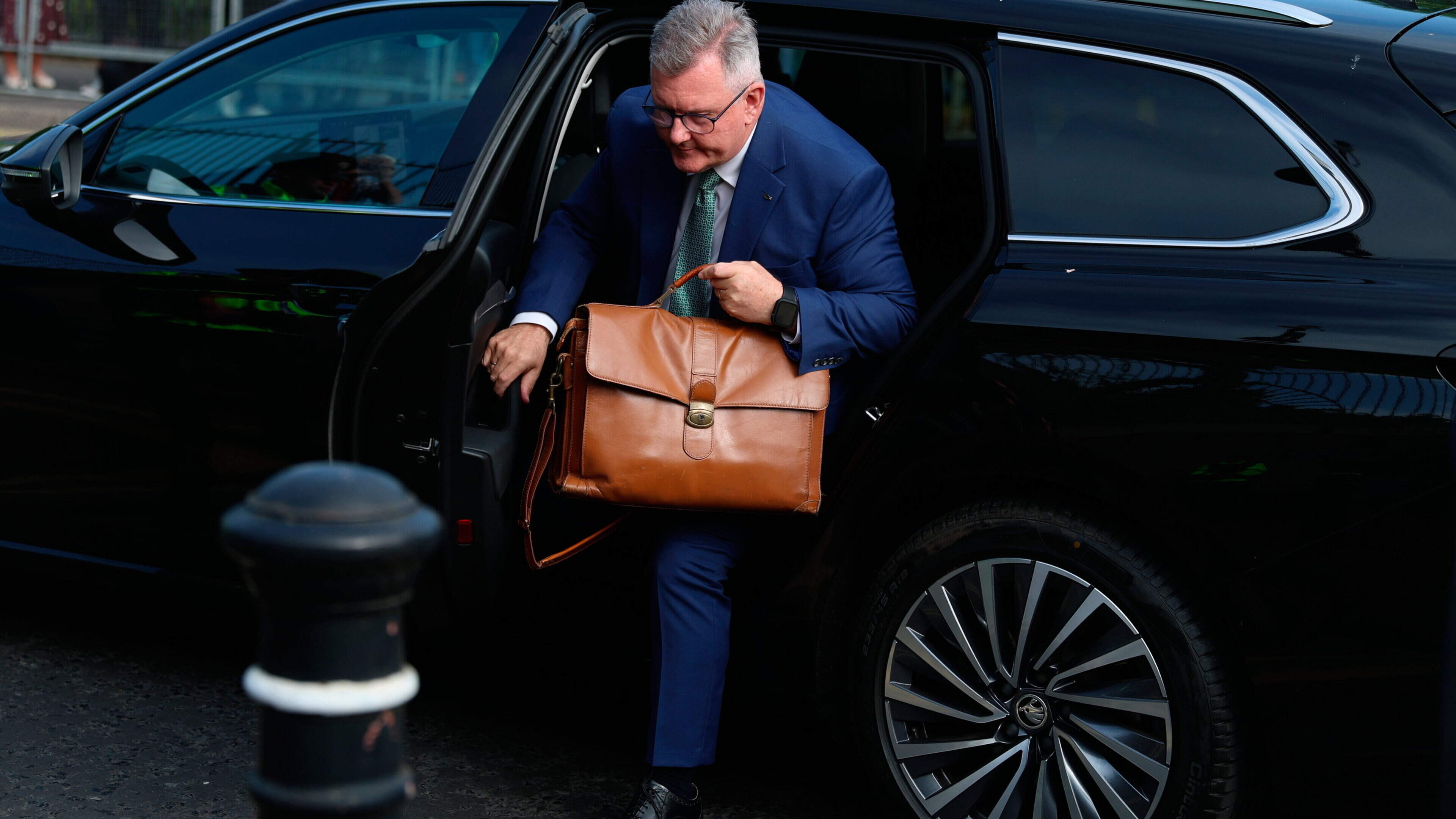 Jeffrey Donaldson arrives for trial as warning issued over online comments