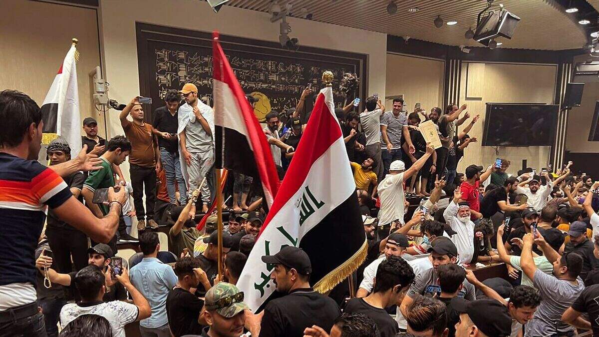 Followers of cleric enter Iraqi parliament in show of force | Belfast ...
