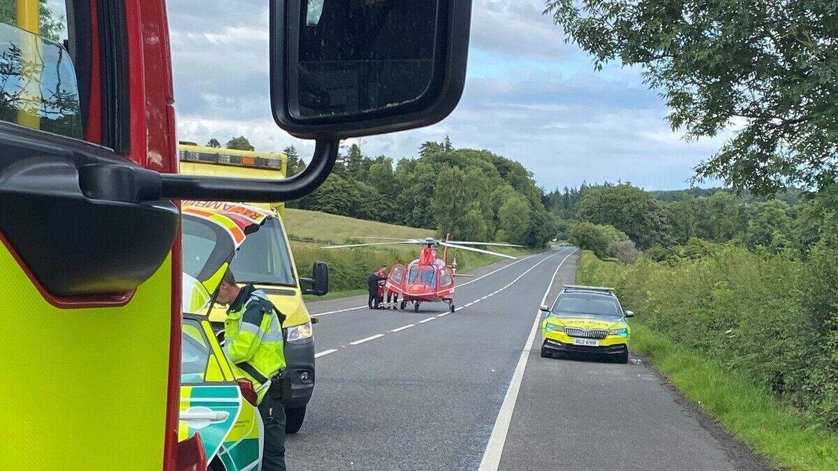 Driver airlifted to hospital after being rescued from car following Co ...