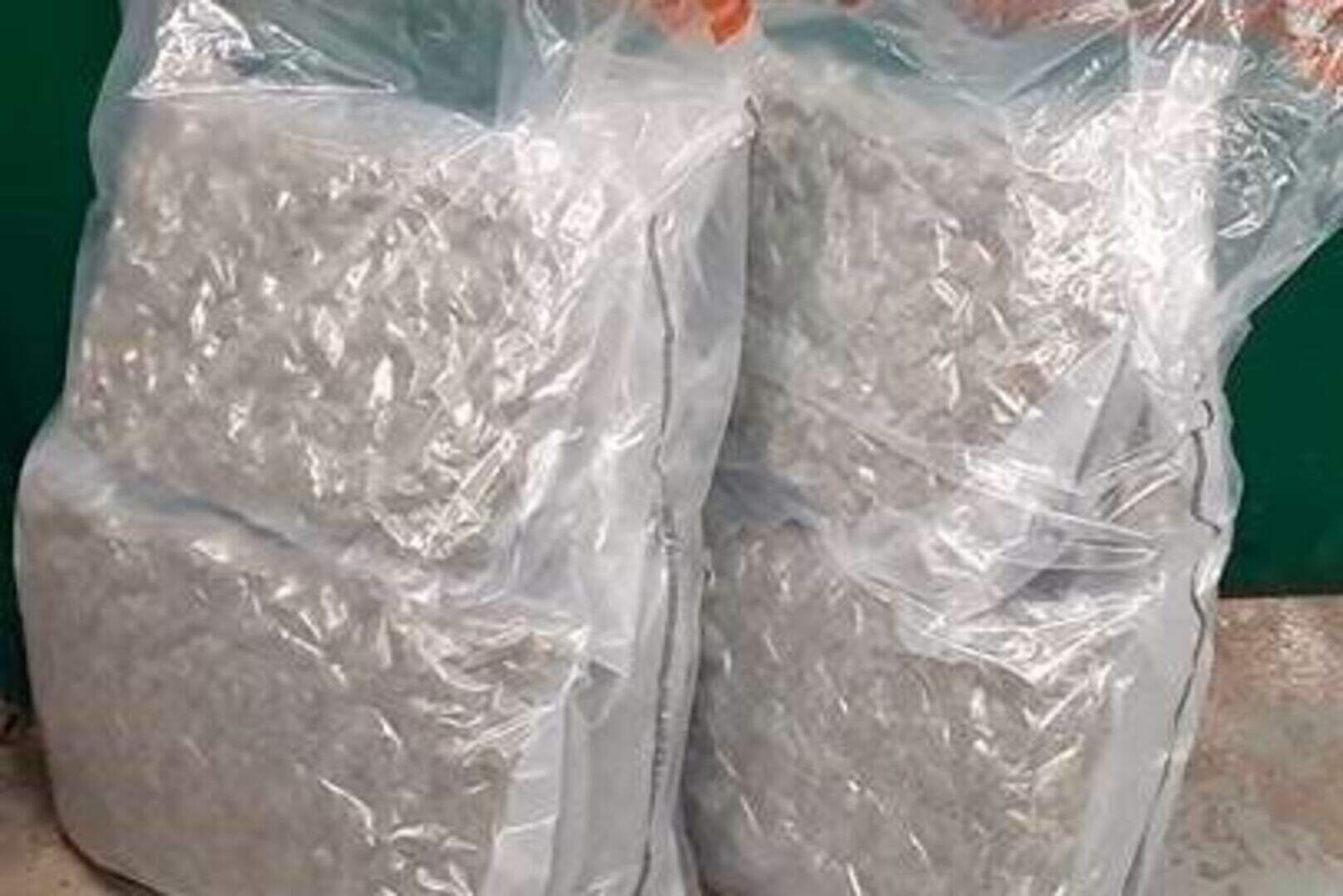 Police seize £125k in cash and £75k worth of drugs after south Belfast ...