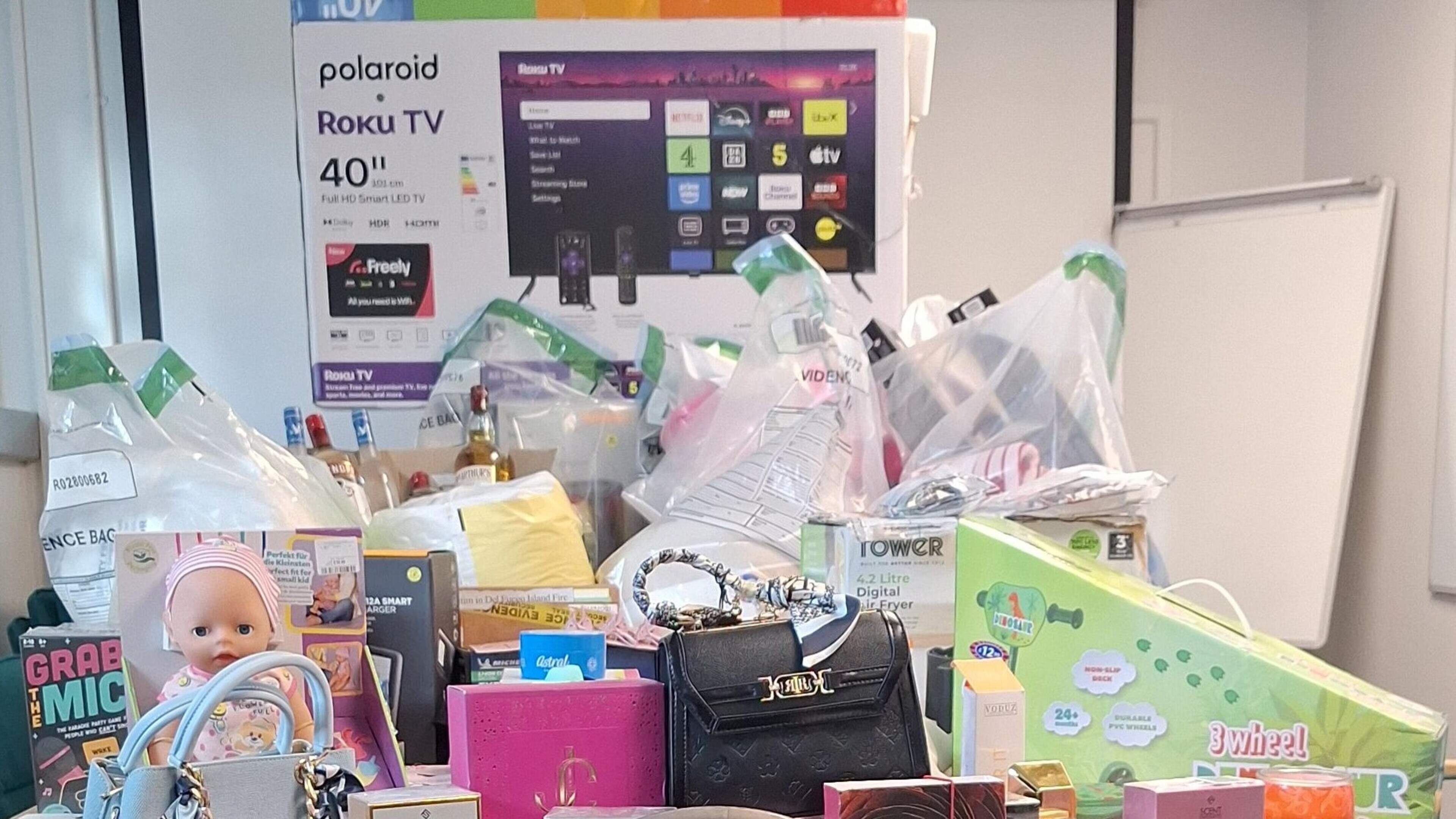 Woman arrested in Belfast over counterfeit cash and stolen goods