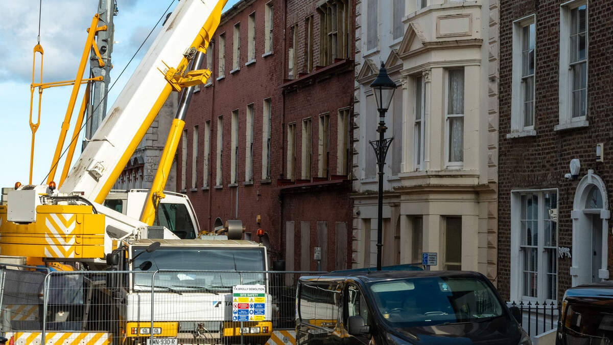 Shipping containers blocking Derry street over safety fears at historic building finally removed after almost a year