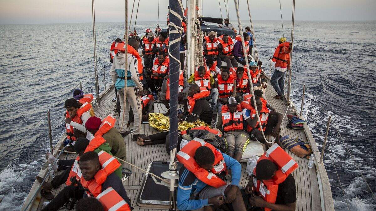 Migrant rescue ship docks in Italian port despite ban | Belfast Telegraph