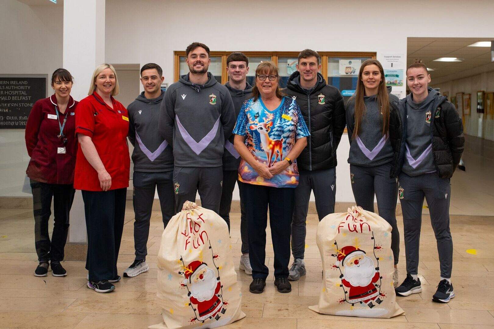 ‘Big smiles all around’: Glentoran players bring festive cheer to young ...