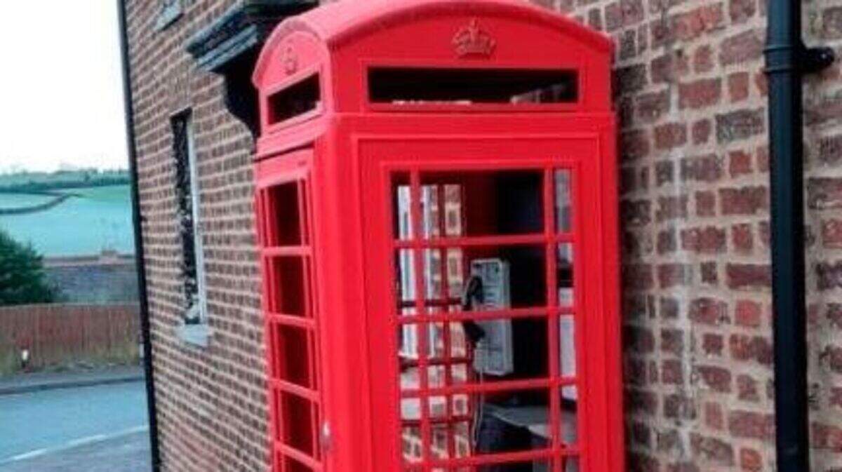 Traditional red phone box in Banbridge set to stay after refurb ...