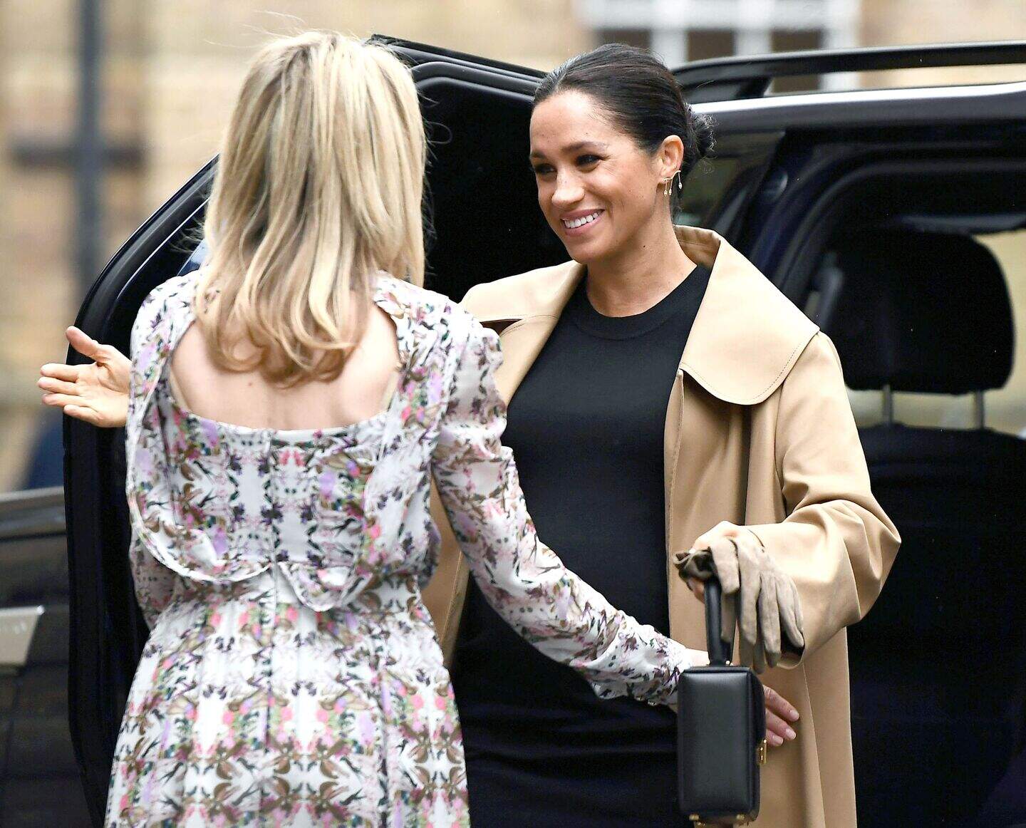 Meghan dishes out fashion tips and mental health advice during charity ...