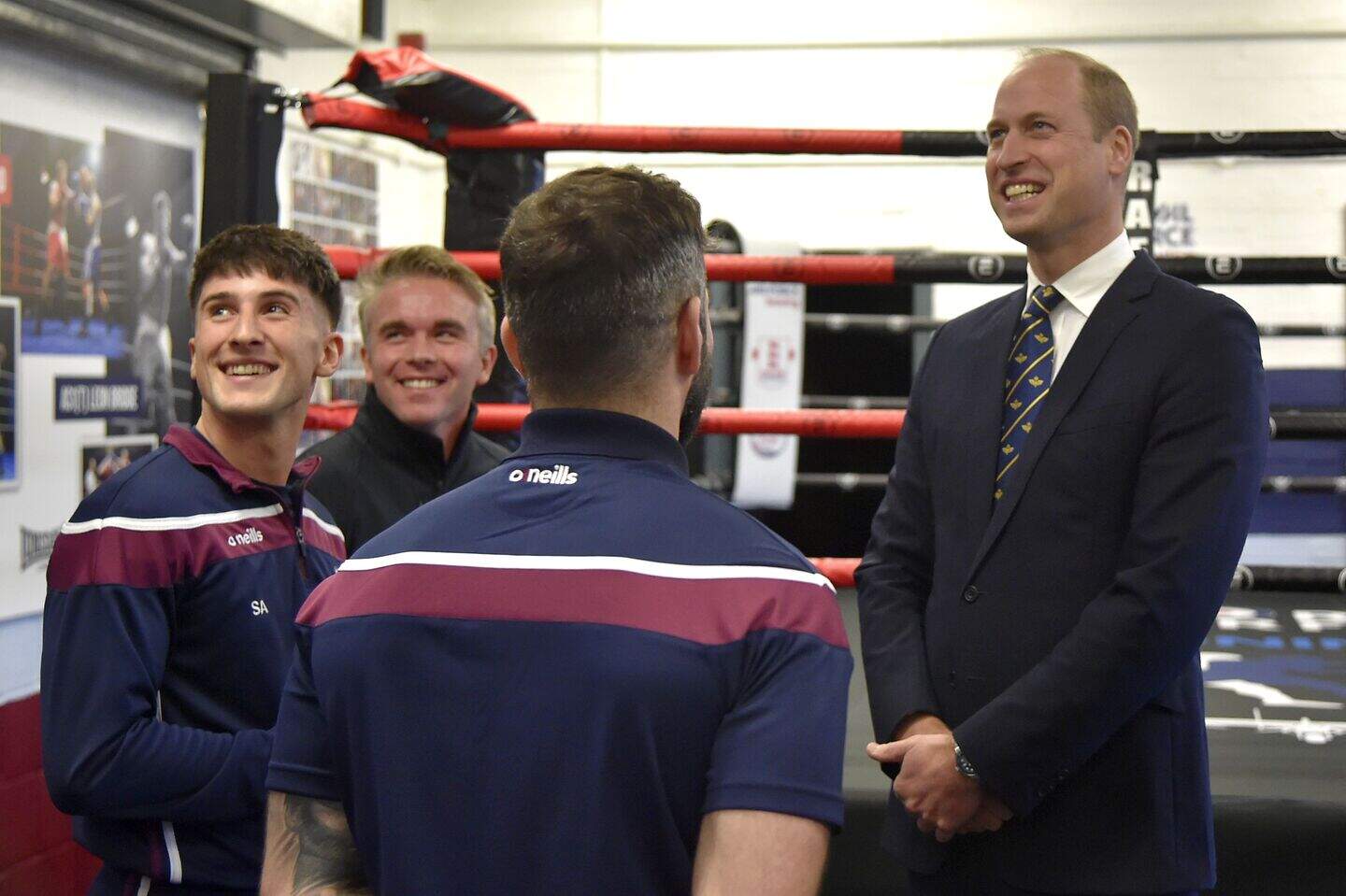 Prince of Wales hugs little boy and promises to put picture on his ...