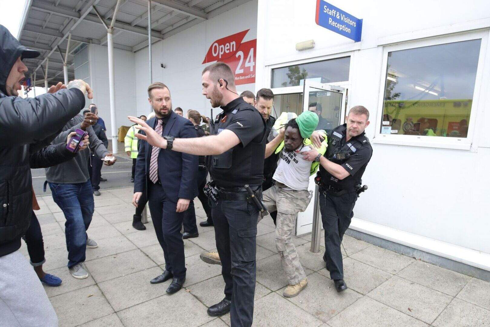 Sacked security worker arrested after protest in Tesco roof space ...