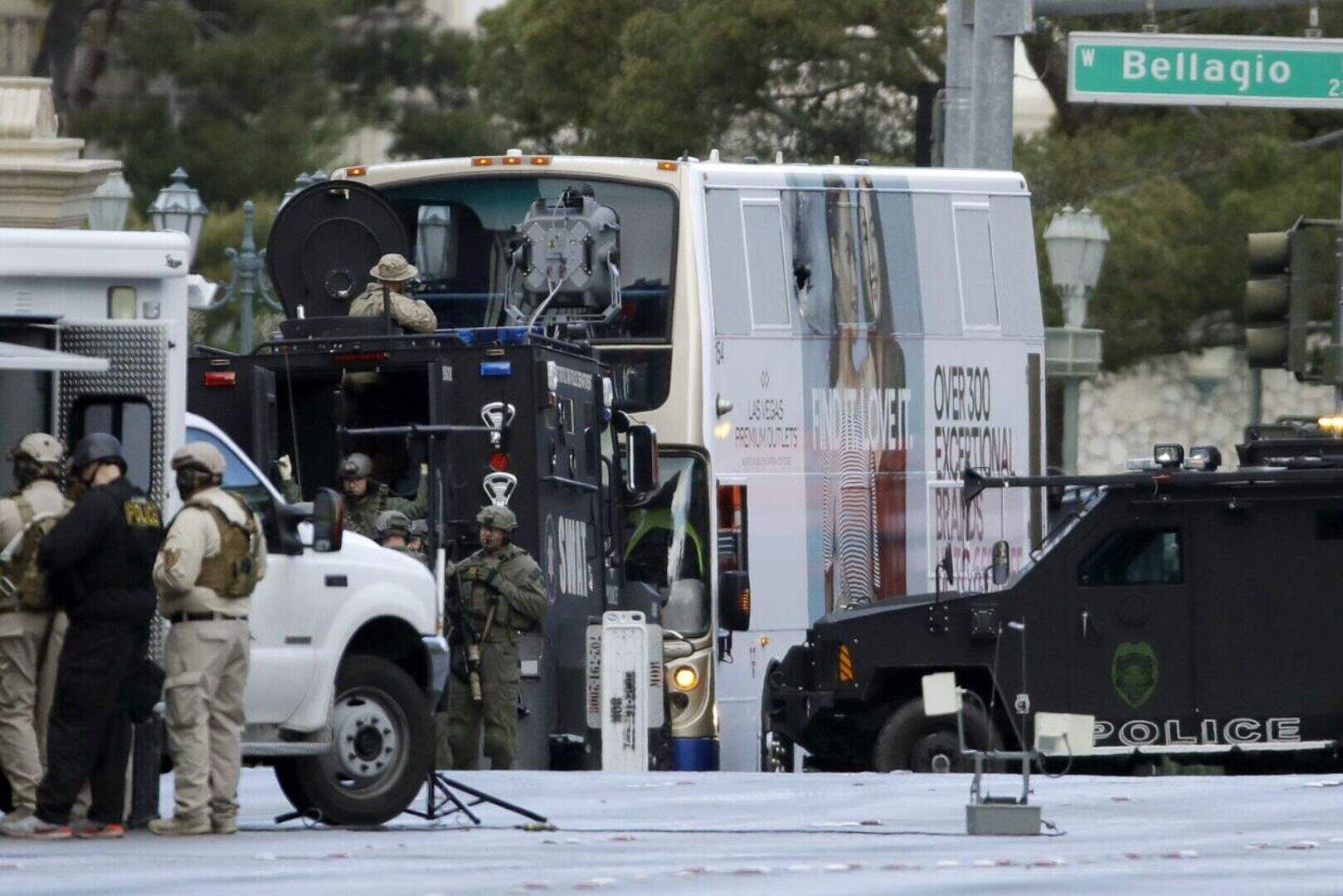 Bus siege gunman surrenders after fatal shooting on Las Vegas strip ...
