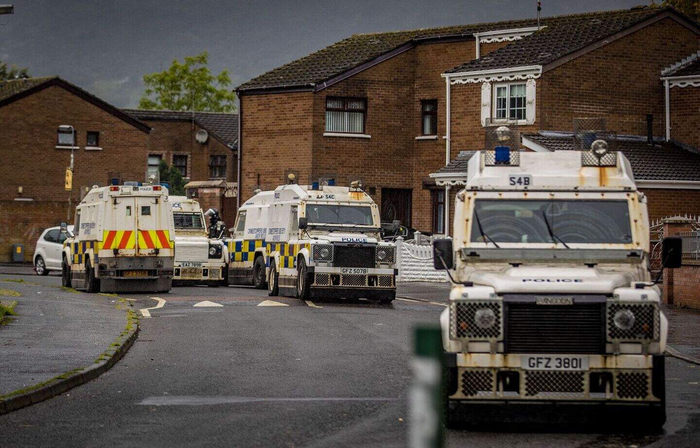 Missiles thrown at PSNI during west Belfast bonfire removal | Belfast ...