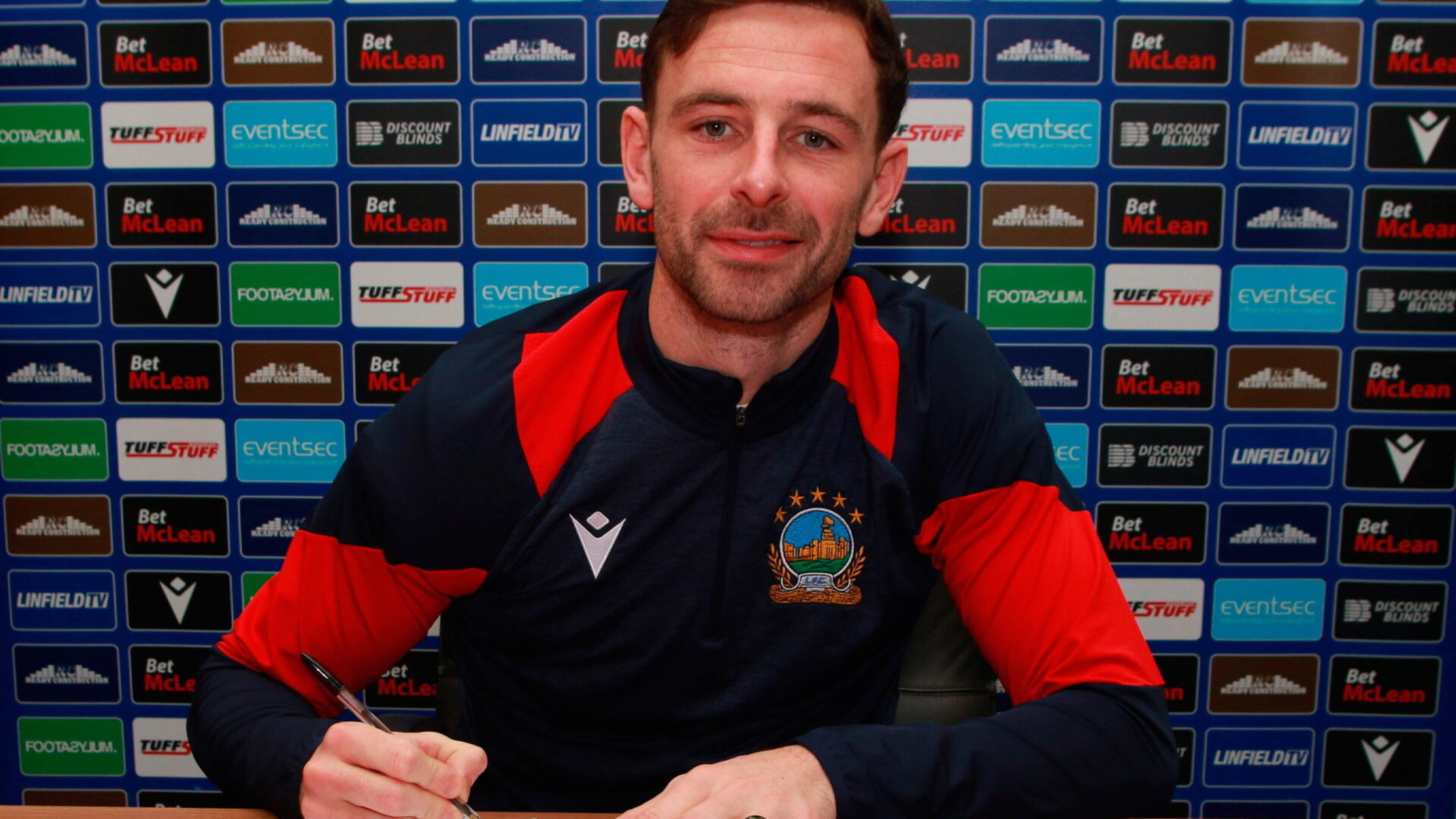 Linfield confident PE teacher Matthew Fitzpatrick will stay at Windsor Park... as rivals circle for his signature