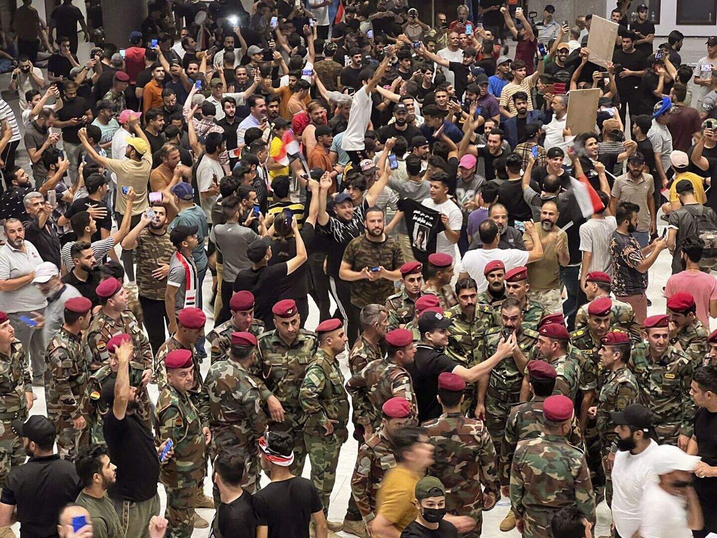 Followers of cleric enter Iraqi parliament in show of force | Belfast ...
