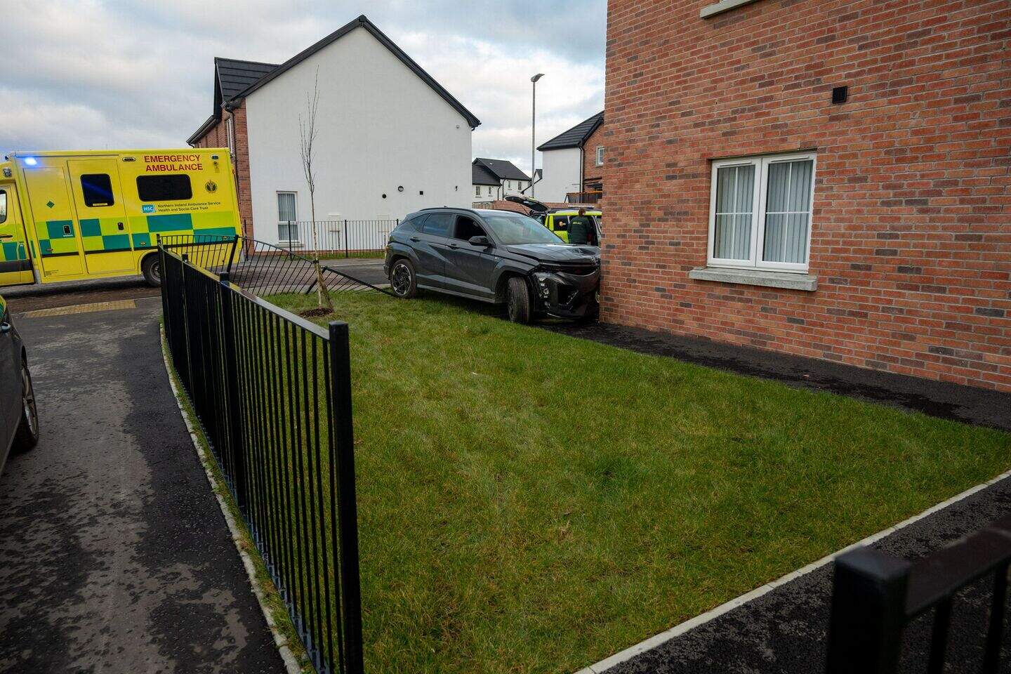 Emergency services respond after car collides with house in Derry ...
