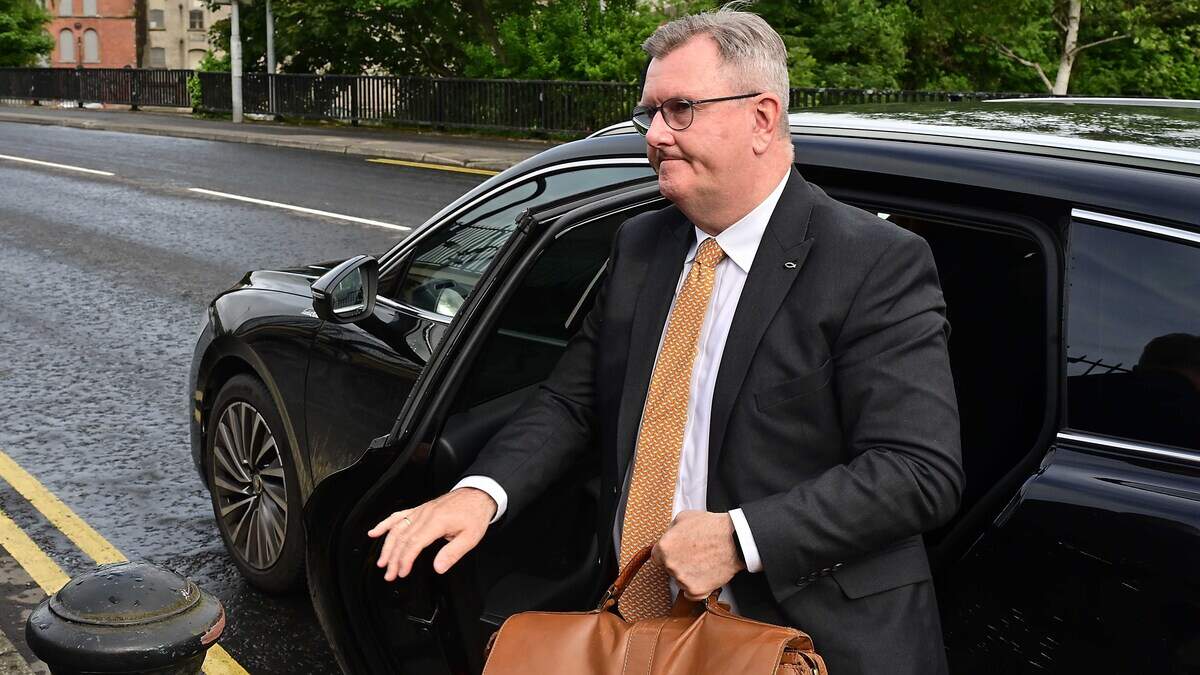 Jeffrey Donaldson arrives at court as trial over alleged historical sexual offences continues