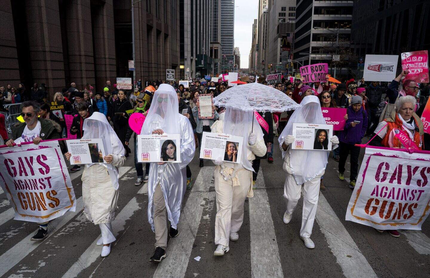 In Pictures: Women across US march on first anniversary of Trump ...