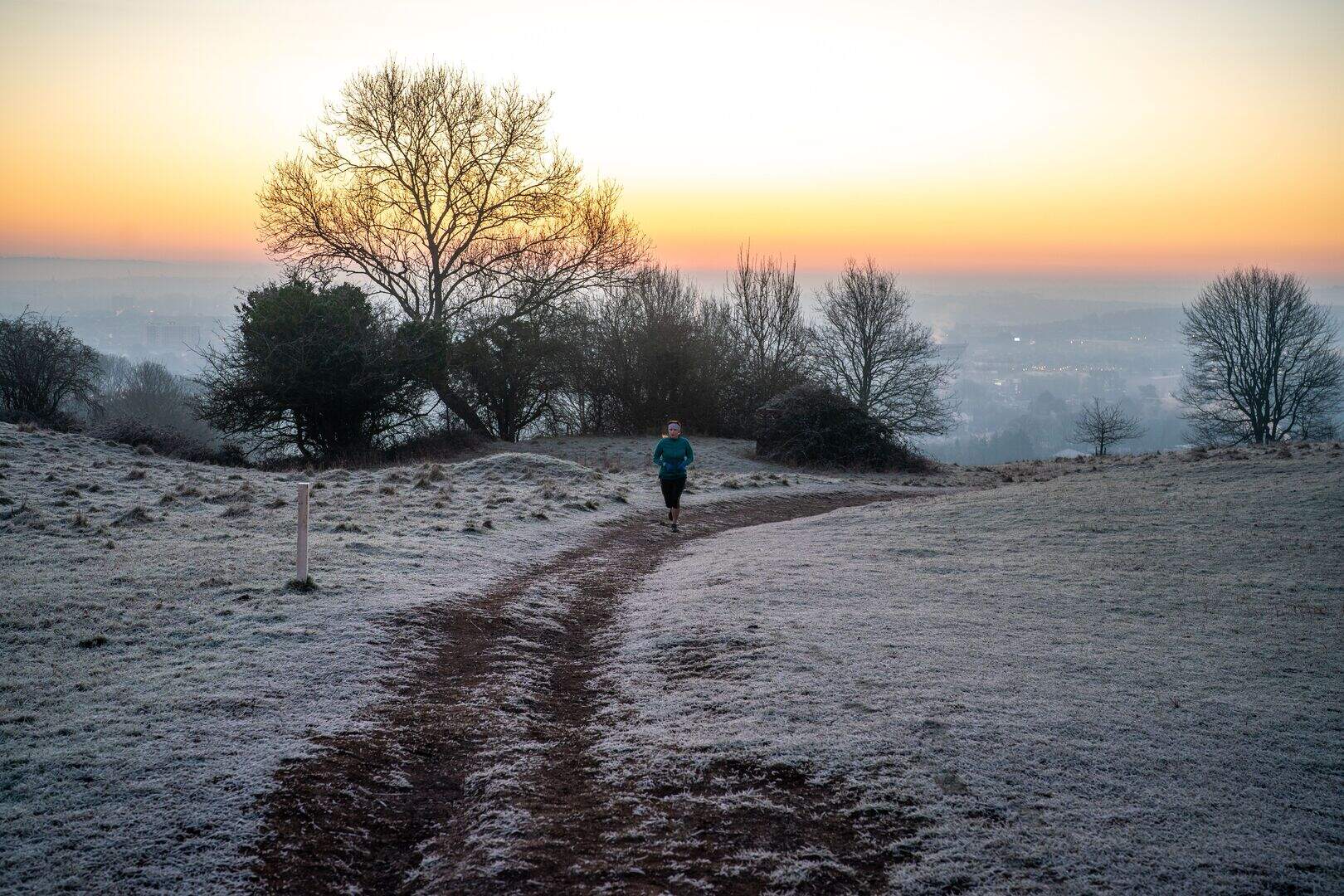 Humans might not hibernate but may still need more winter sleep, study ...