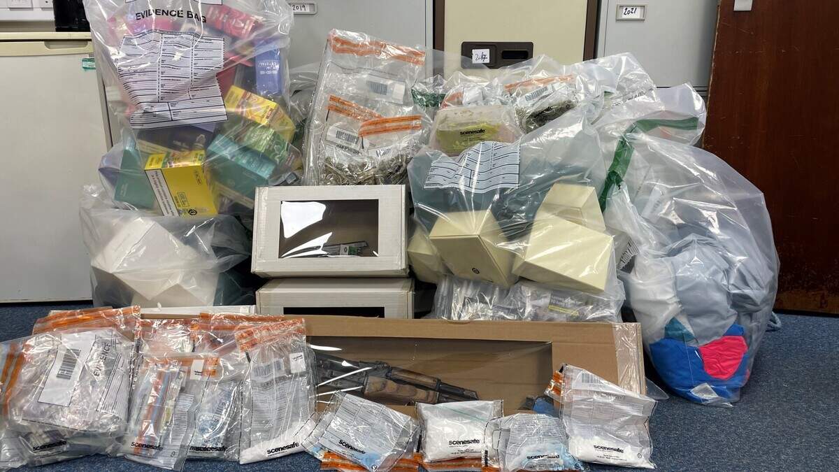 Mother and son appear in court after police seize £50k in drugs and guns at home