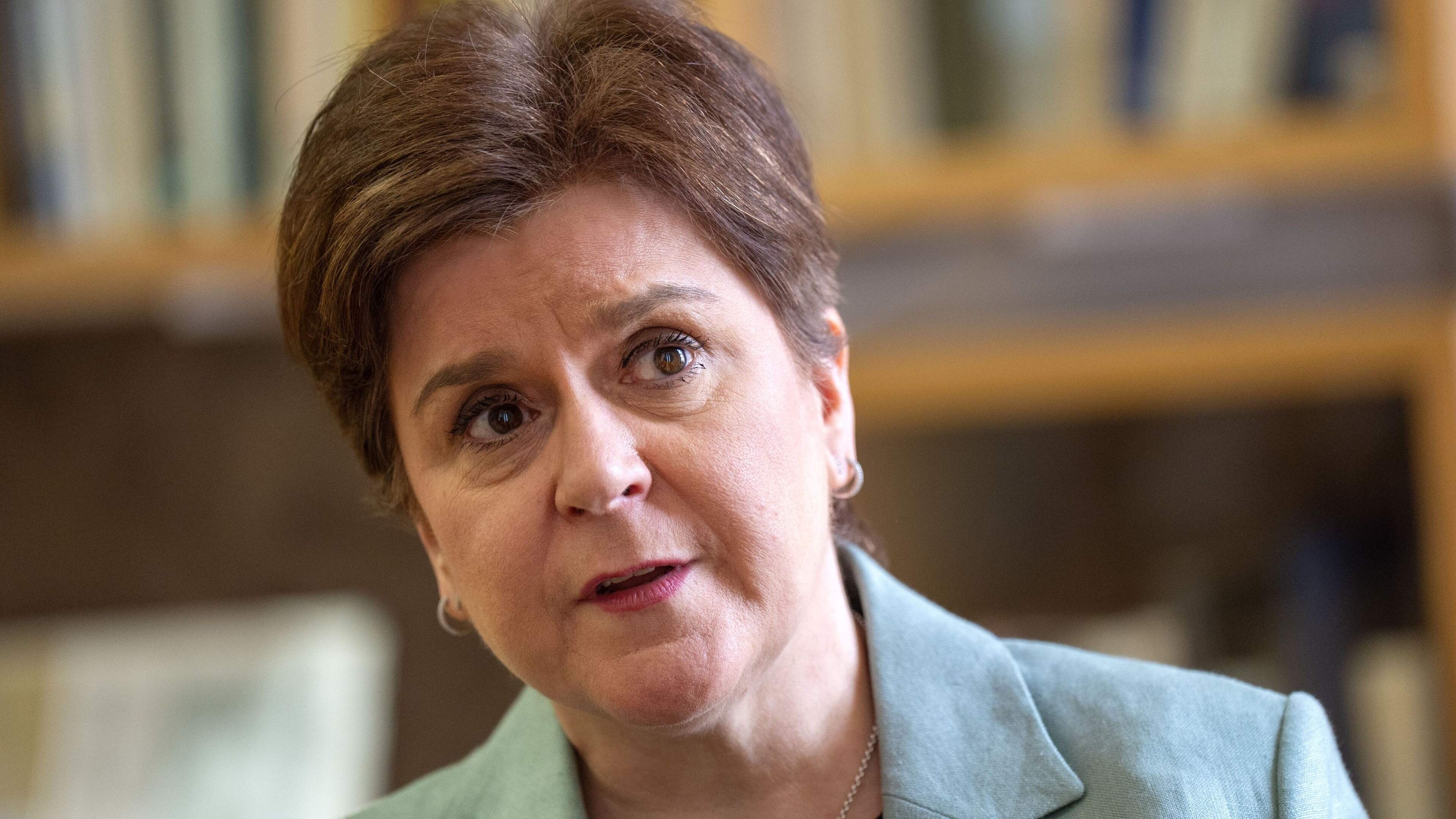 Tasteless jokes the least of Sturgeon’s worries as estranged husband’s crimes set tongues wagging