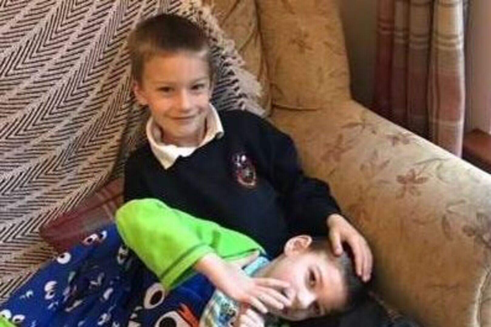 Northern Ireland twins struck down with meningitis battle back to raise ...