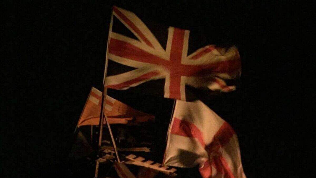 Union flags set alight on Halloween pyre in Strabane | Belfast Telegraph