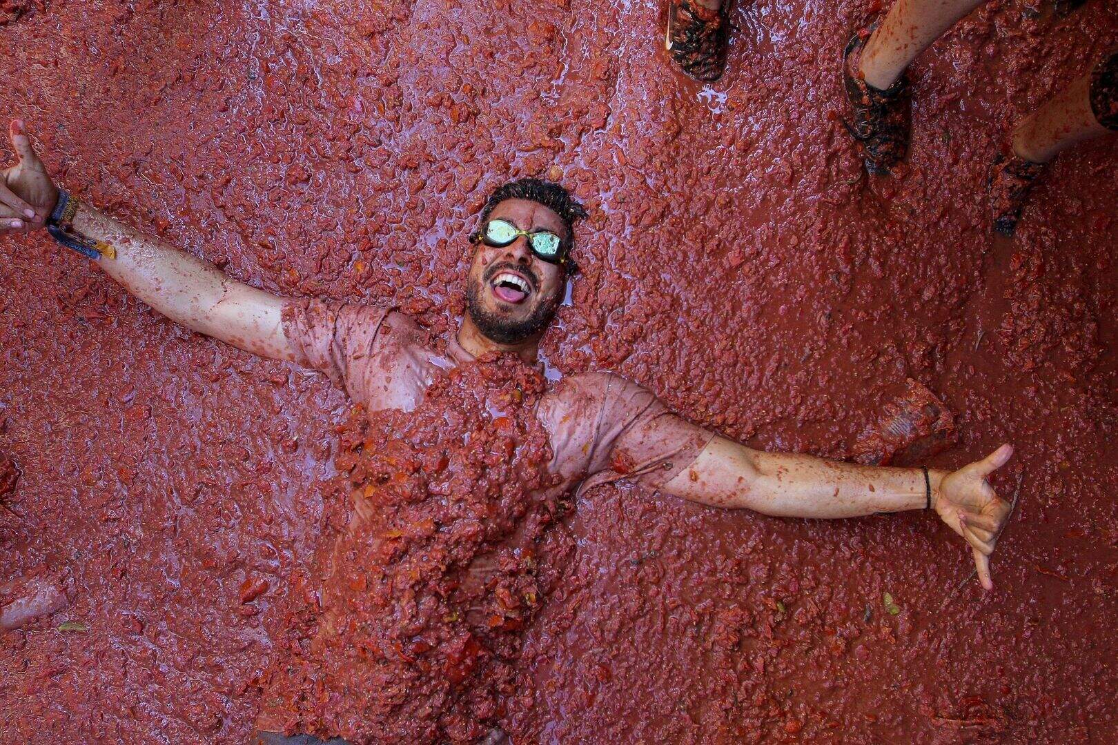 Thousands drenched in red in Spain’s Tomatina battle | Belfast Telegraph