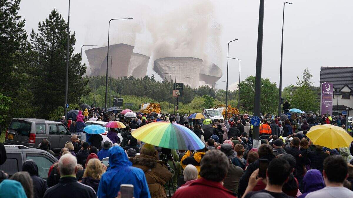 Former power station’s cooling towers demolished in controlled ...