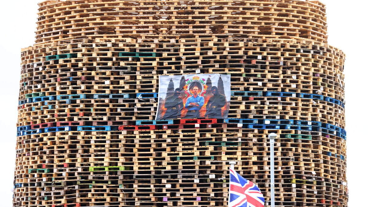 Bonfire condemned after banner hailing ‘godfather of terrorism' is placed on pyre