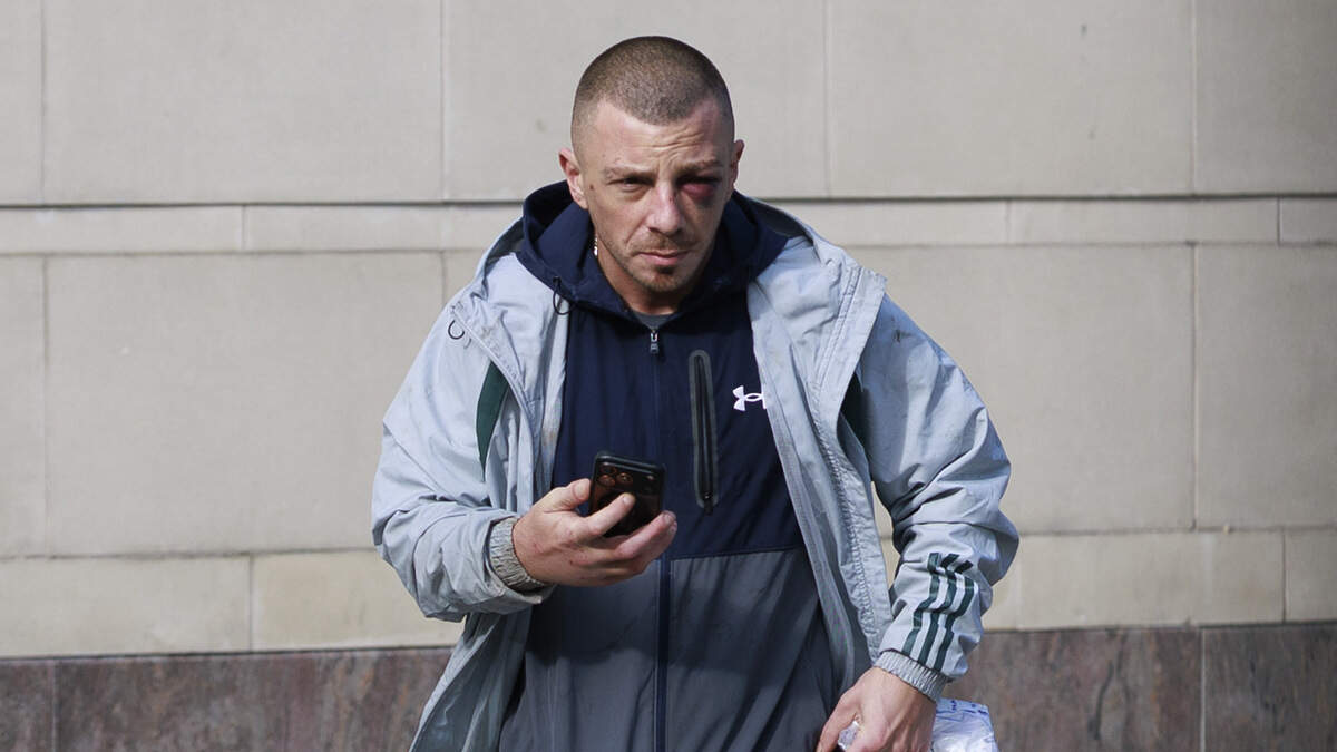 Carer accused of punching pensioner in the face and spitting blood at police shows up to court with a black eye and cut nose