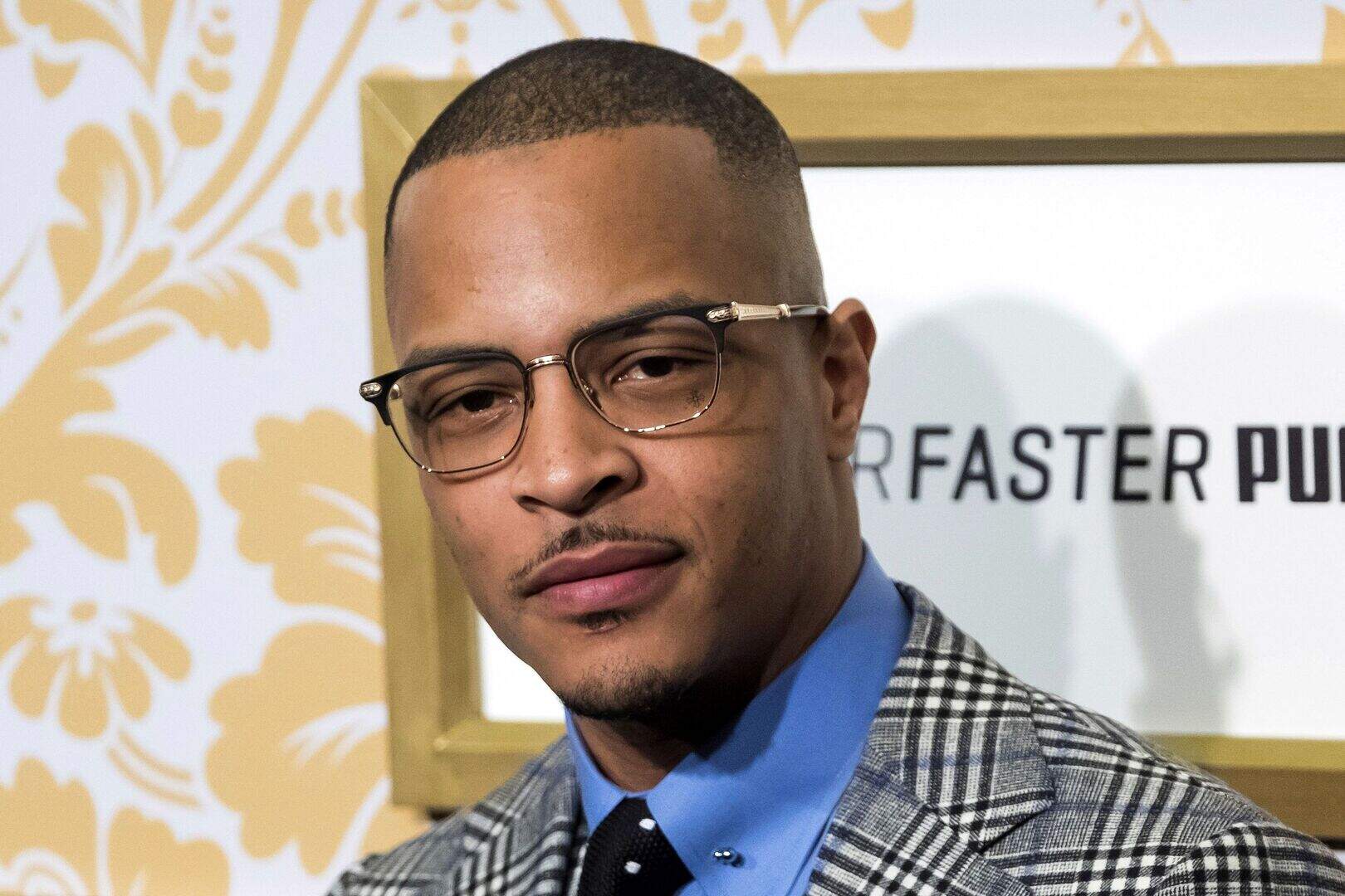 Rapper TI arrested outside gated community after security guard row ...
