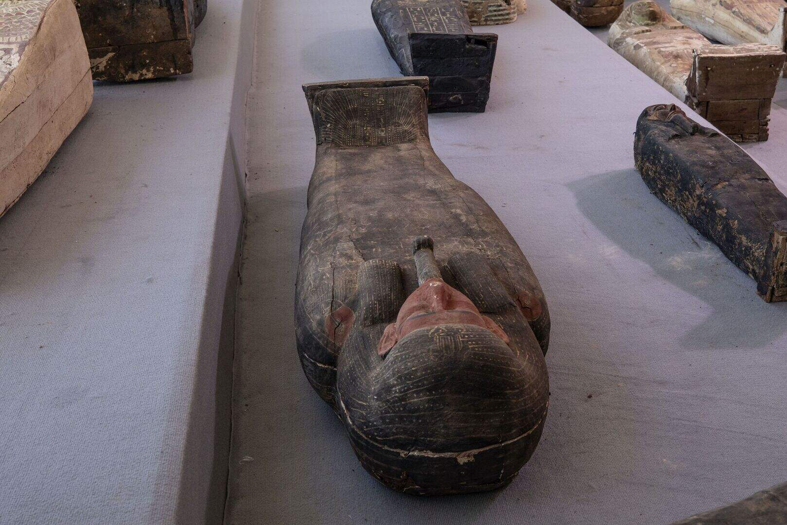 Egypt unveils ancient coffins and mummies found in huge necropolis ...