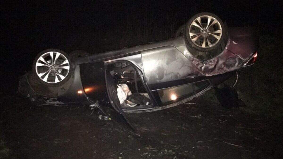 Man arrested for drink driving as shocking pic shows car on roof after ...