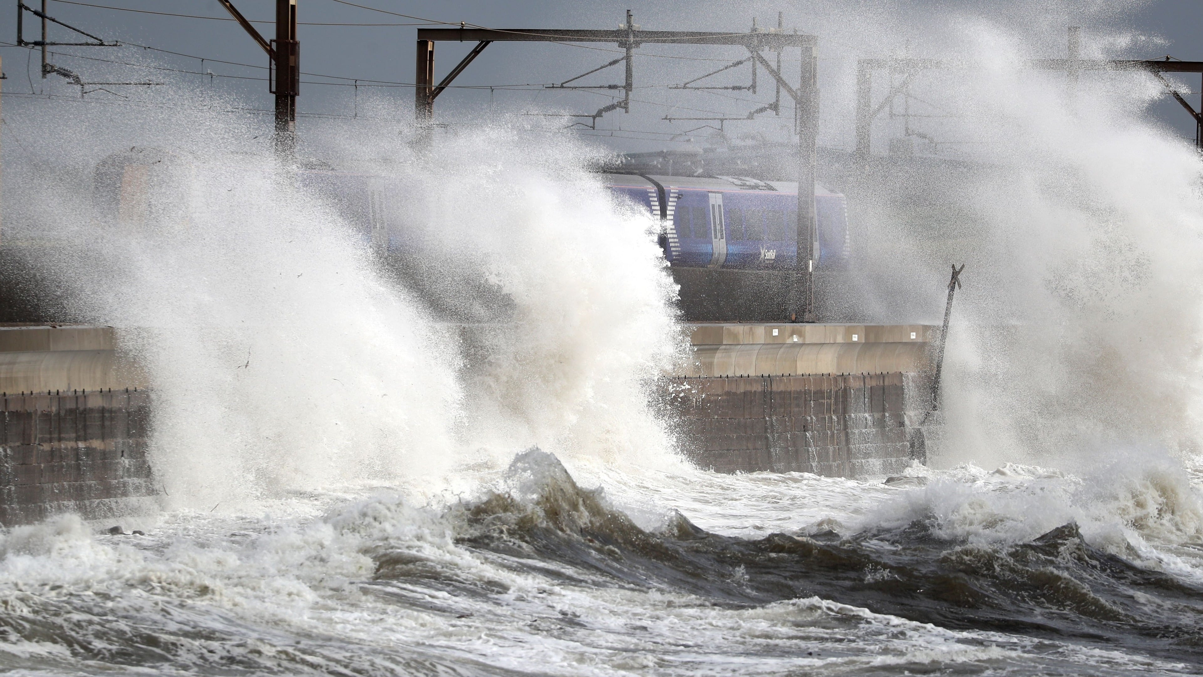 Schools shut and travel disruption as windy weather sweeps Scotland after storm