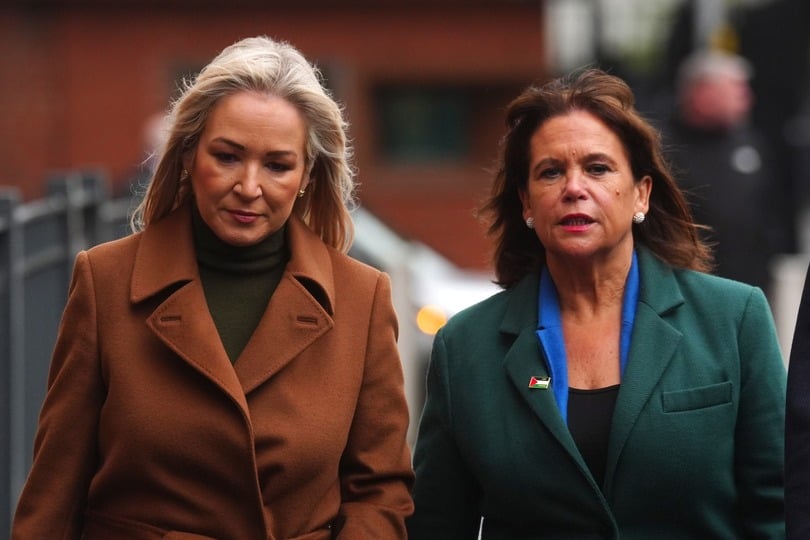 First Minister Michelle O’Neill (left) and Sinn Fein President Mary Lou McDonald arrive at Musgrave St police station in Belfast (Brian Lawless/PA)