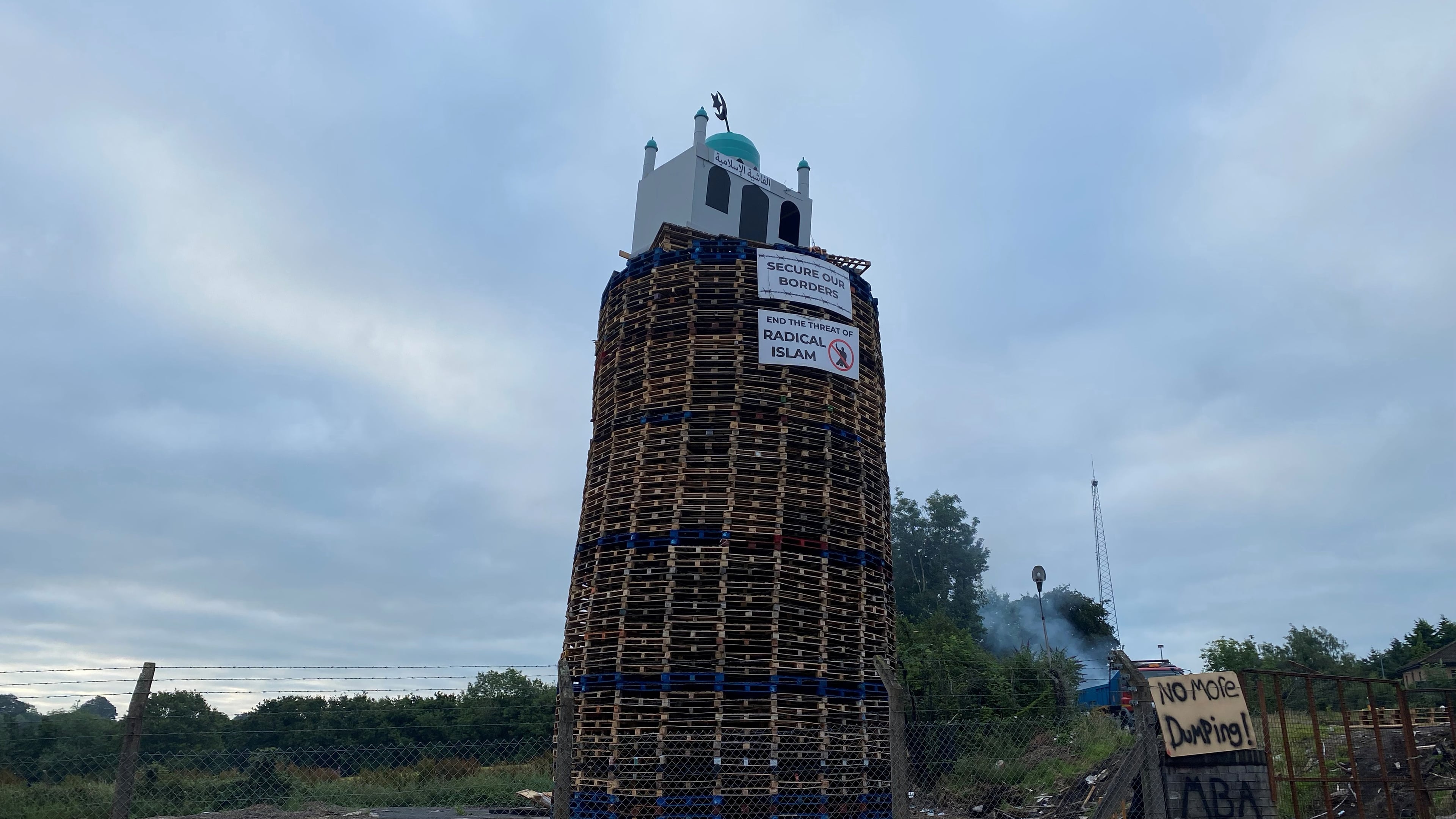 Tree surgeon charged over controversial Moygashel bonfire claims he didn’t know mosque model was under tarpaulin