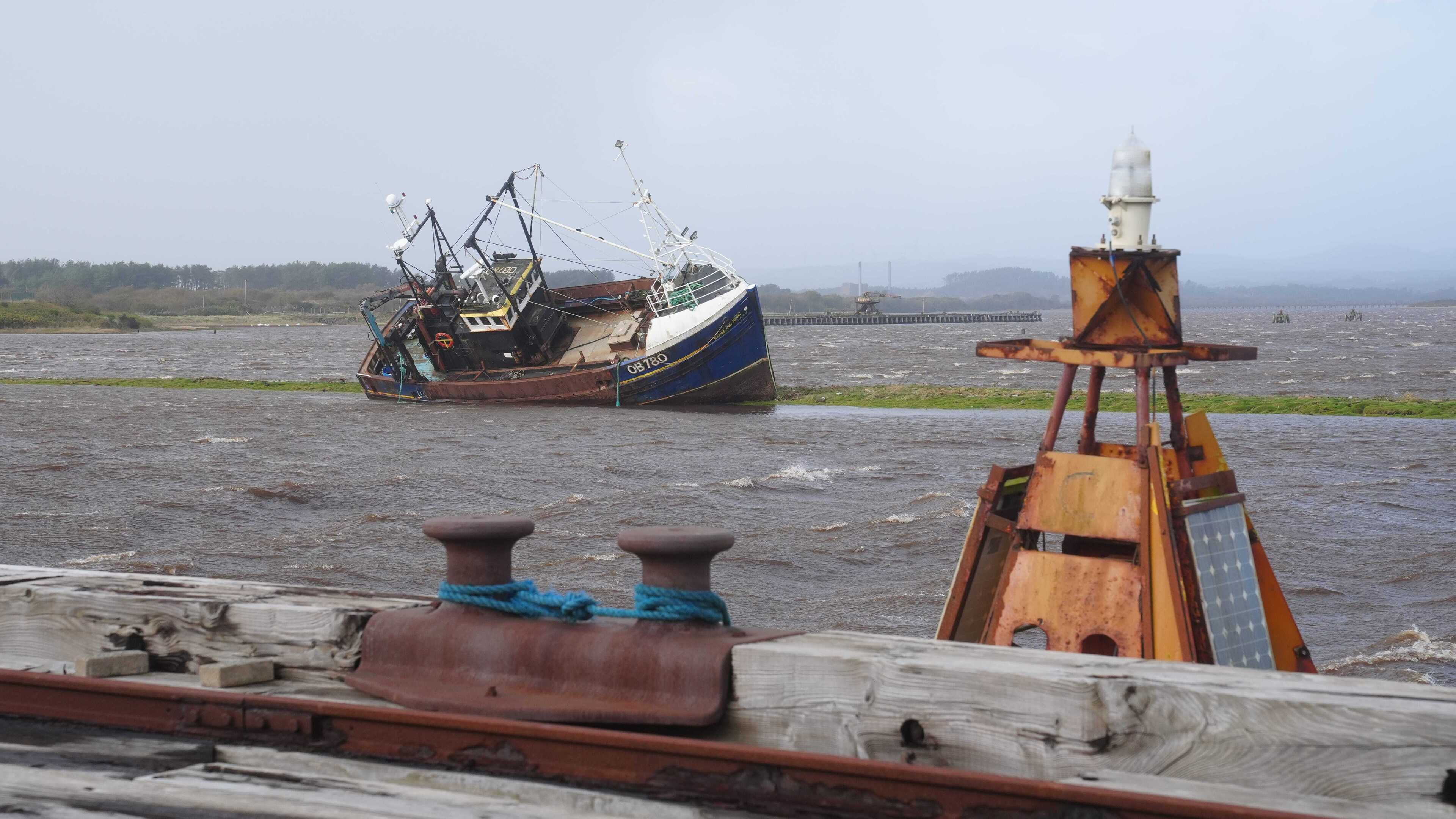 Coastal communities told to remain vigilant for floods as wind warnings lifted