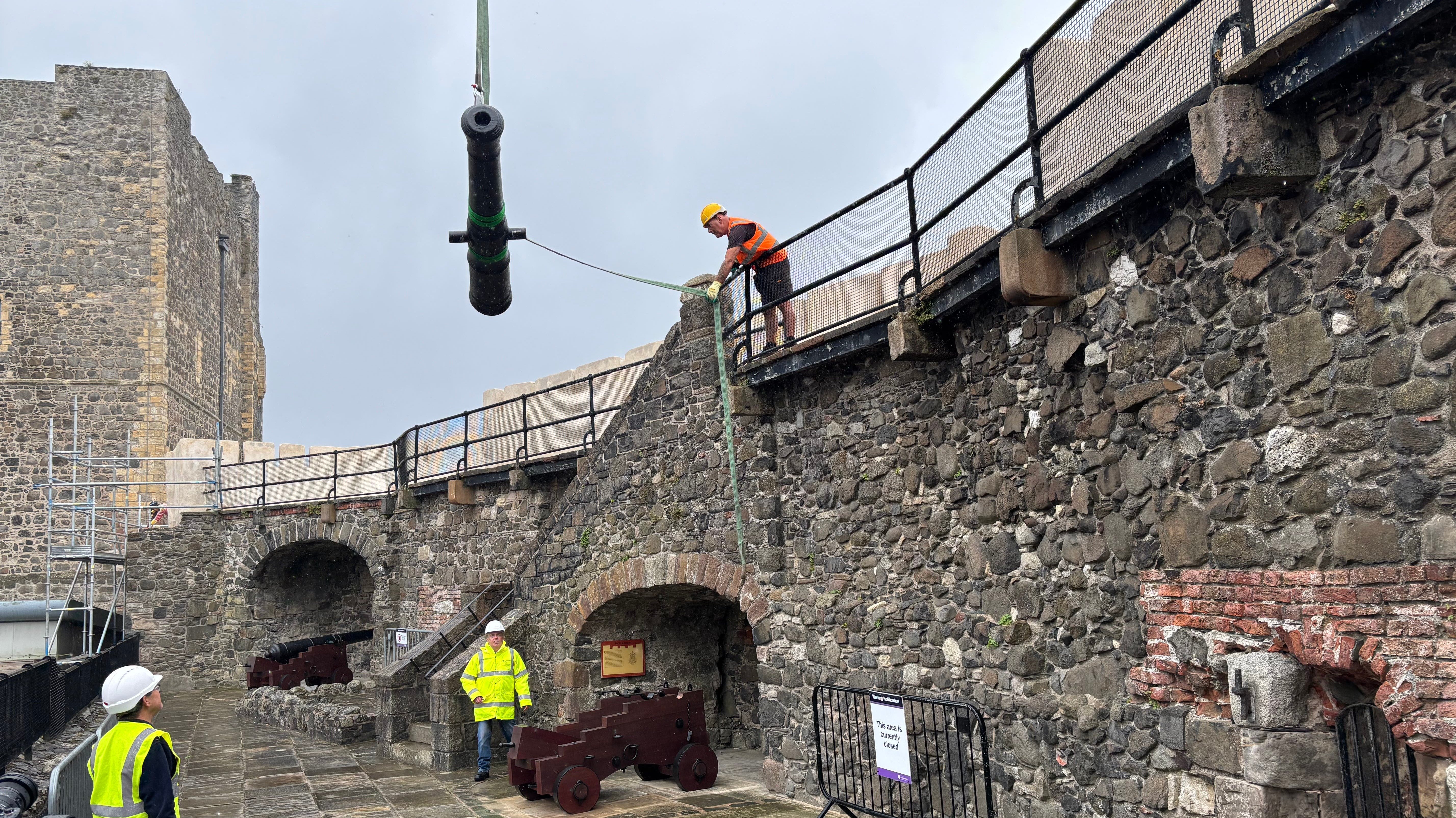 Historic cannon return to Carrickfergus Castle after restoration work