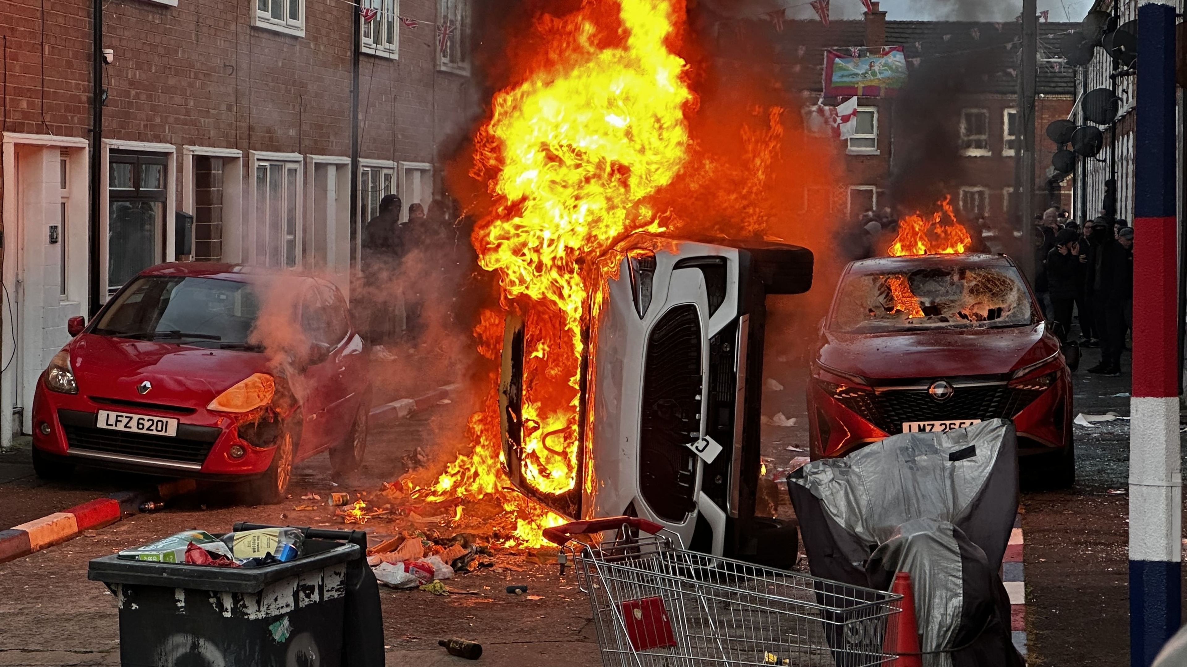 Belfast knife attack: victim’s family urges calm and says unrest is not welcome