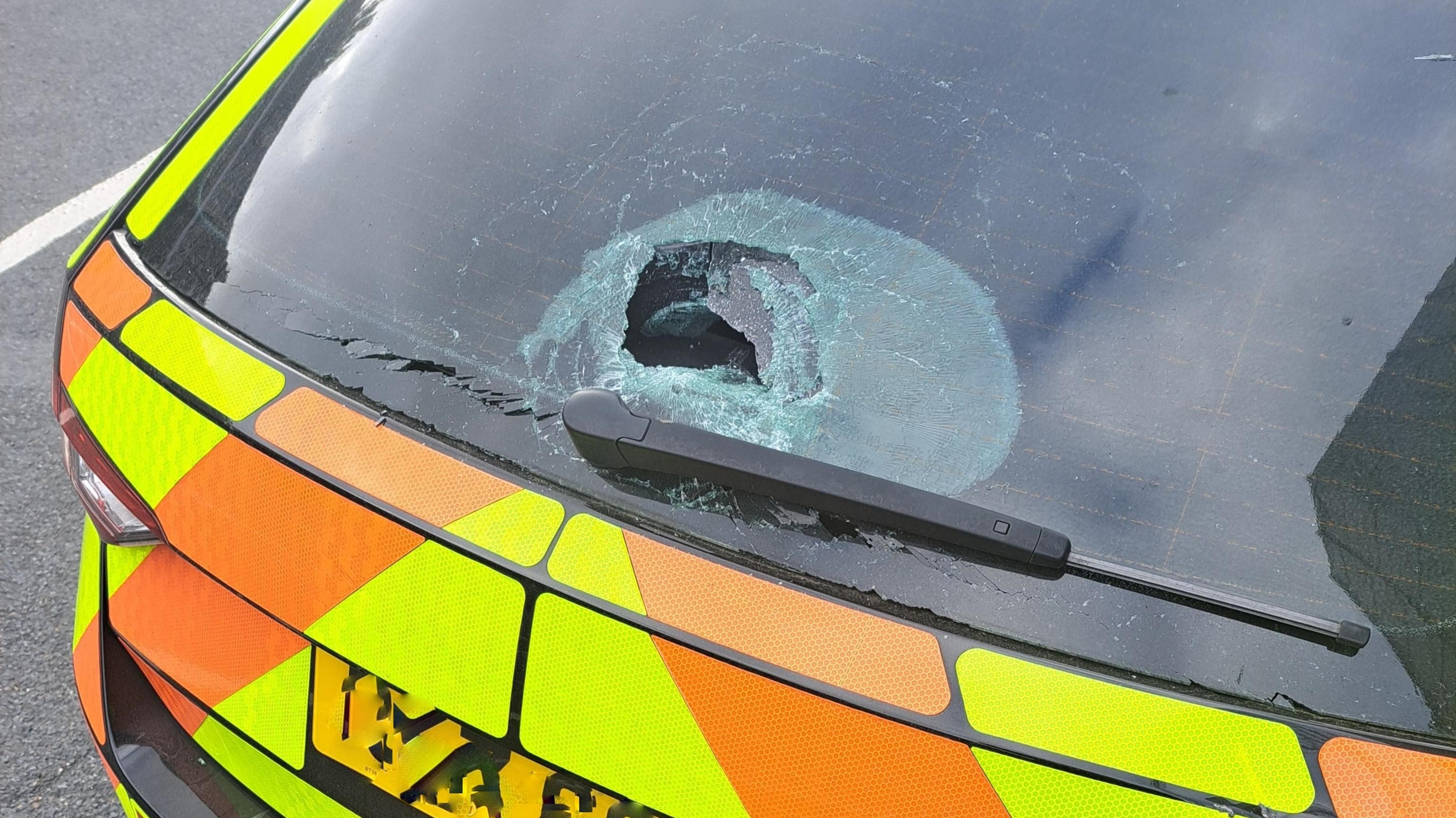 Officers hurt and vehicles damaged as police attacked at car meet
