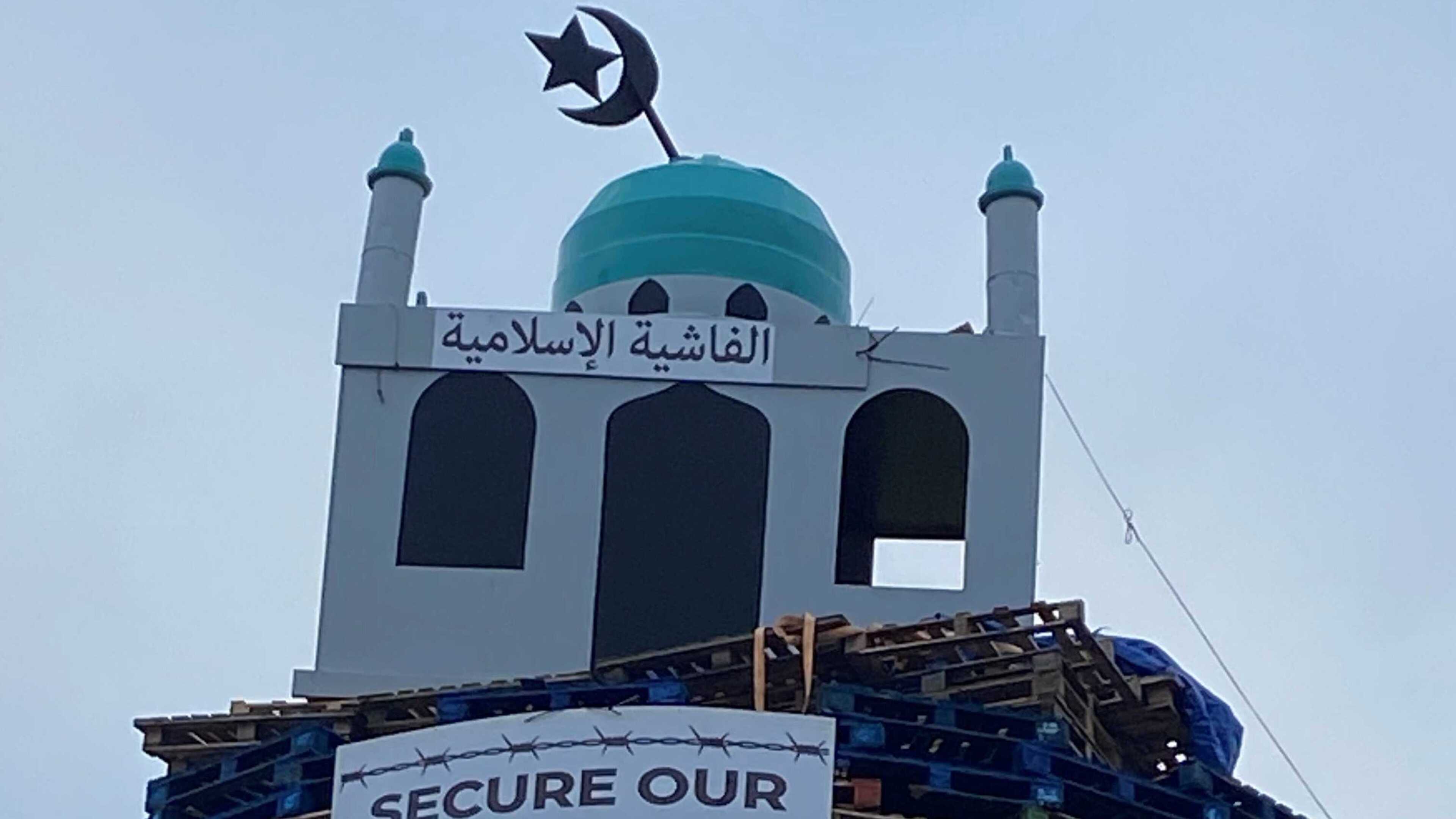 Loyalist bonfire in Co Tyrone lit early after police begin to remove mosque replica