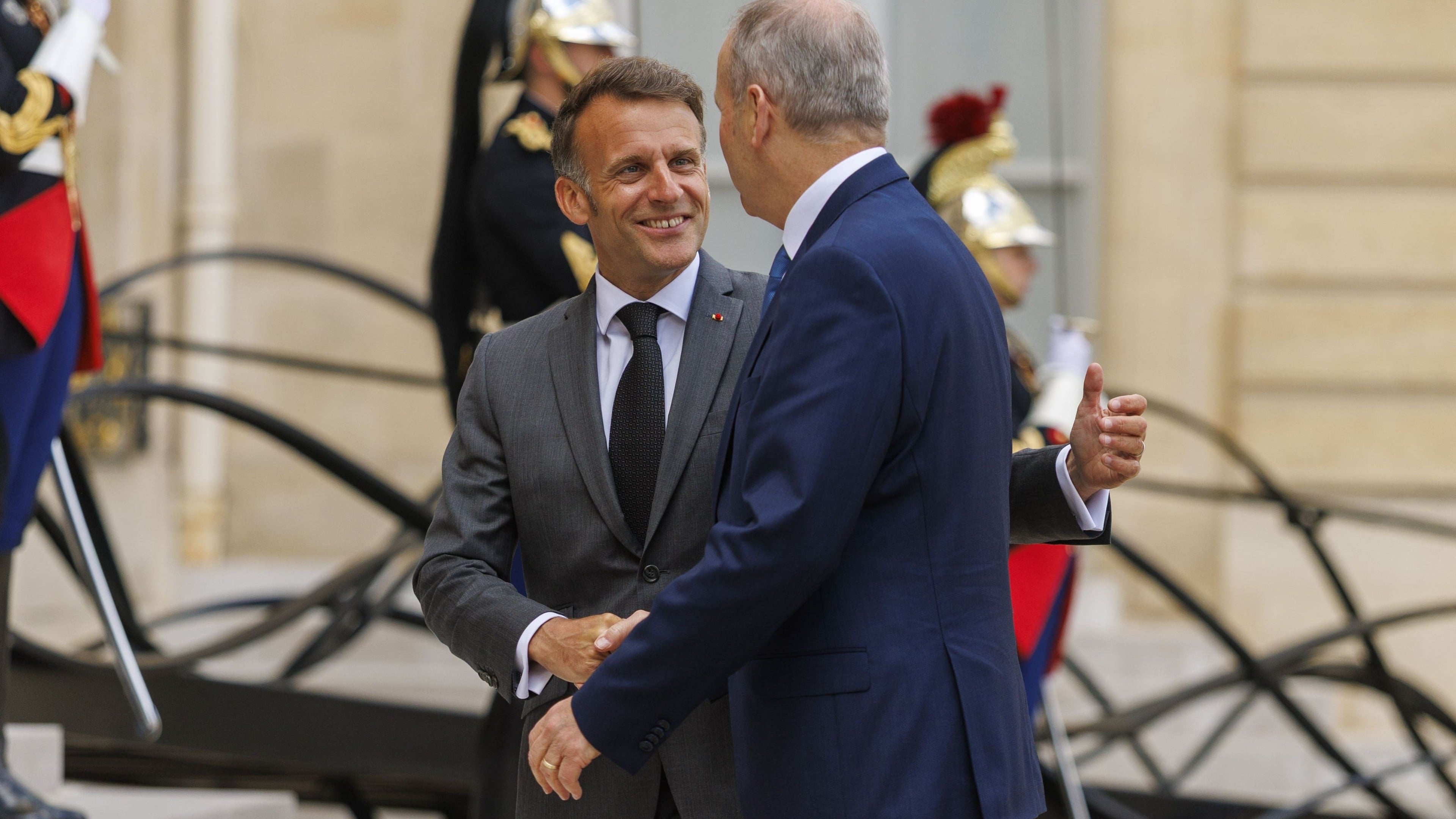 Taoiseach greeted by French president on arrival for talks in Paris